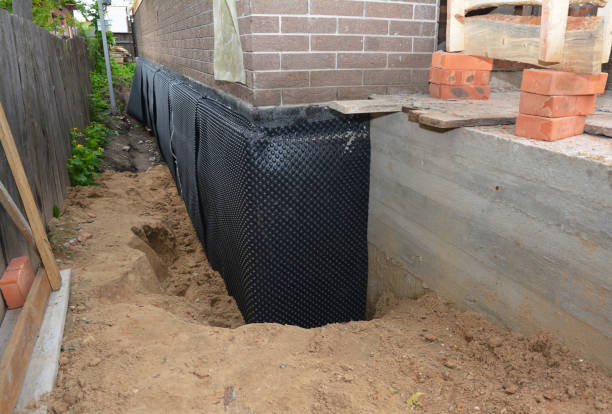 Happy homeowners after waterproofing job in Temple Hills